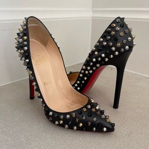 Christian Louboutin studded black leather pumps